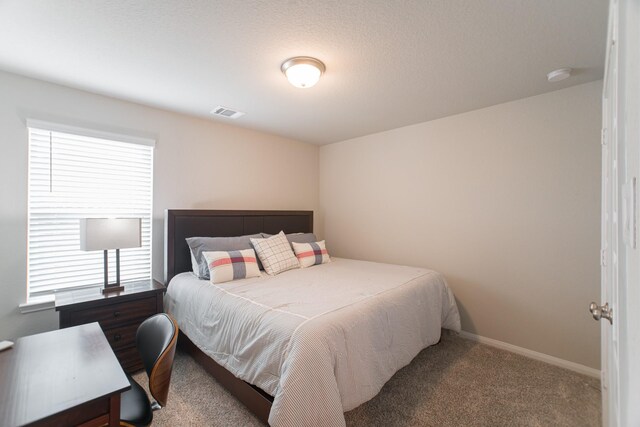 17542 Rosette Grass Dr, Conroe, TX 77385 - bedroom with carpet and baseboards