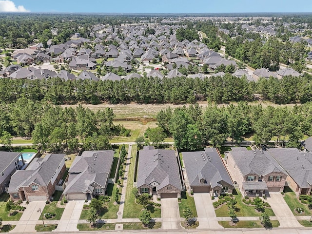 10029 Red Beadtree Pl, Conroe, TX 77385 - aerial overview of property's location featuring nearby suburban area