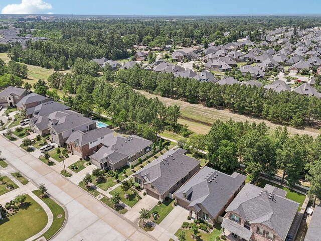 10029 Red Beadtree Pl, Conroe, TX 77385 - aerial view of property's location with nearby suburban area