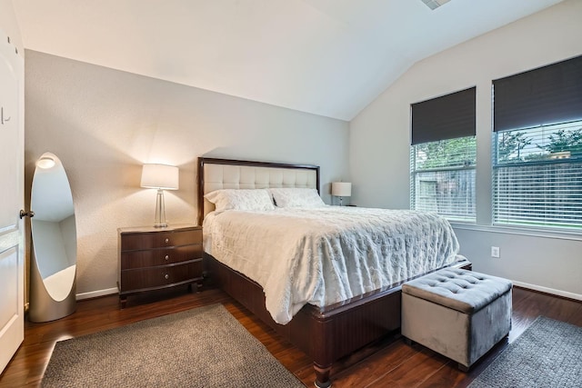 2604 Hewn Rock Way, Pearland, TX 77584 - bedroom with lofted ceiling, wood finished floors, and baseboards