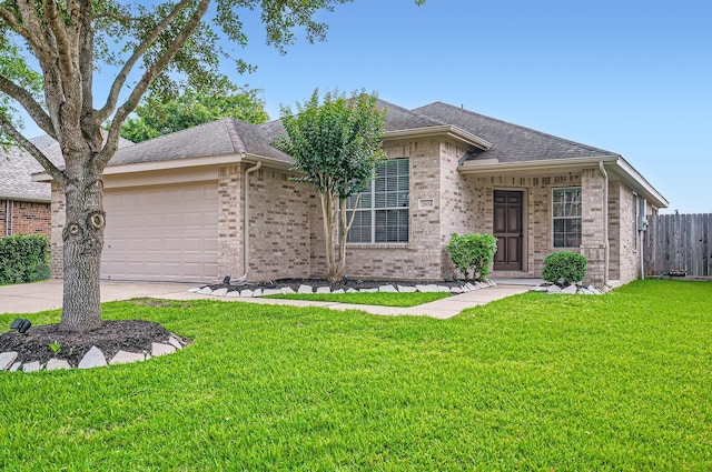2604 Hewn Rock Way, Pearland, TX 77584 - ranch-style home with brick siding, a garage, roof with shingles, and concrete driveway