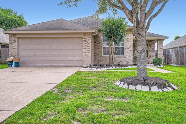 2604 Hewn Rock Way, Pearland, TX 77584 - single story home with brick siding, an attached garage, concrete driveway, and roof with shingles
