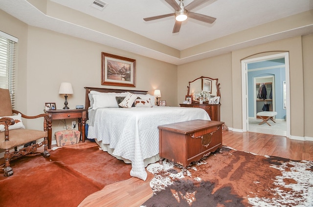 24511 Pelican Hill Dr, Katy, TX 77494 - bedroom featuring wood finished floors, baseboards, and ceiling fan