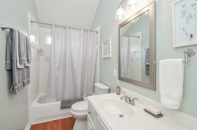 24511 Pelican Hill Dr, Katy, TX 77494 - bathroom featuring toilet, vanity, shower / bath combo with shower curtain, and wood finished floors