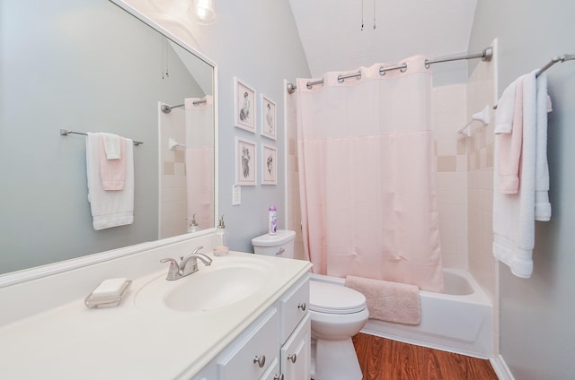 24511 Pelican Hill Dr, Katy, TX 77494 - bathroom featuring toilet, vanity, wood finished floors, and shower / bath combo