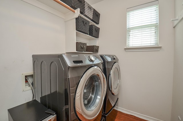 24511 Pelican Hill Dr, Katy, TX 77494 - washroom with washer and clothes dryer, baseboards, and wood finished floors