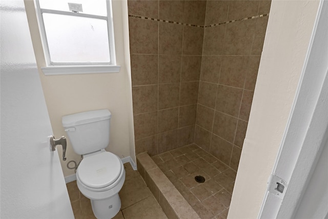 10211 Golden Meadow Dr, Houston, TX 77064 - bathroom with toilet, a stall shower, and tile patterned flooring