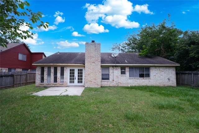 10211 Golden Meadow Dr, Houston, TX 77064 - back of house with a chimney, a patio, french doors, brick siding, and a shingled roof
