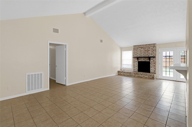 10211 Golden Meadow Dr, Houston, TX 77064 - unfurnished living room with plenty of natural light, light tile patterned flooring, high vaulted ceiling, beamed ceiling, and a brick fireplace