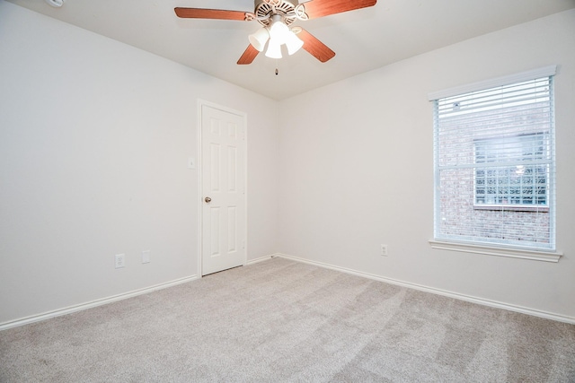 21126 N Yellow Bud Ct, Cypress, TX 77433 - spare room with light carpet, baseboards, and ceiling fan