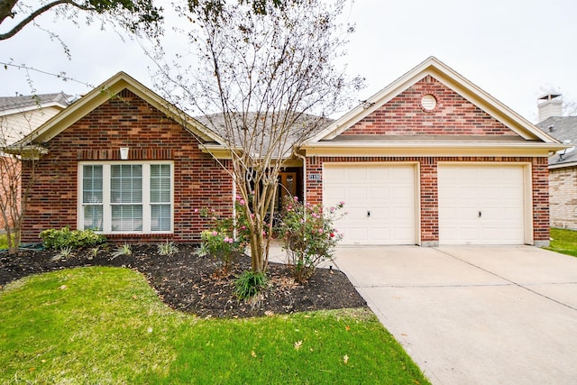 21126 N Yellow Bud Ct, Cypress, TX 77433 - view of front of property featuring brick siding, driveway, a garage, and a front lawn