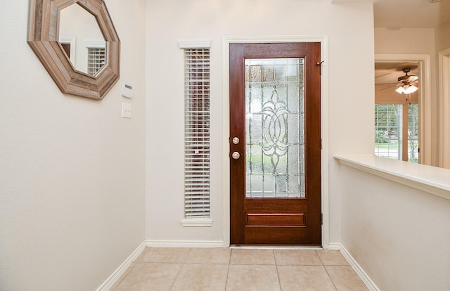 21126 N Yellow Bud Ct, Cypress, TX 77433 - foyer with light tile patterned floors, baseboards, and a ceiling fan