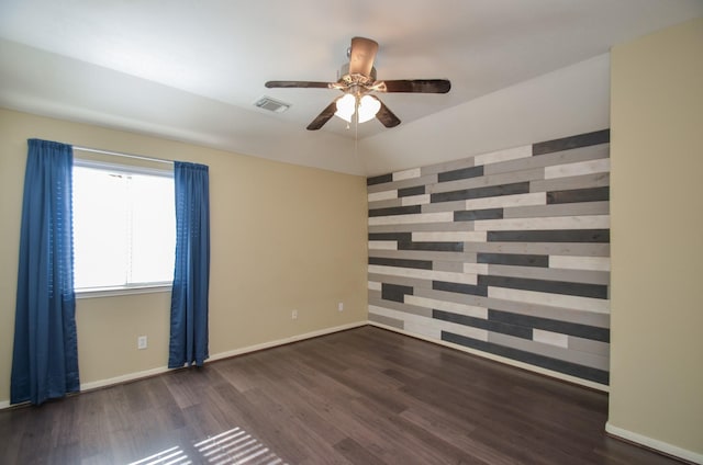 17719 Creek Bluff Ln, Cypress, TX 77433 - spare room featuring wood finished floors, ceiling fan, and baseboards