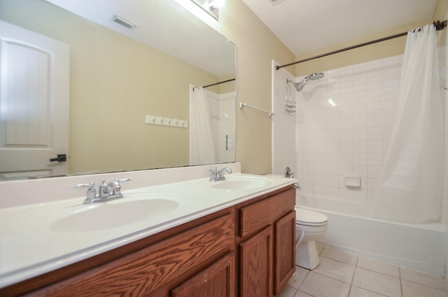 17719 Creek Bluff Ln, Cypress, TX 77433 - full bath with shower / bath combination with curtain, tile patterned flooring, double vanity, and toilet