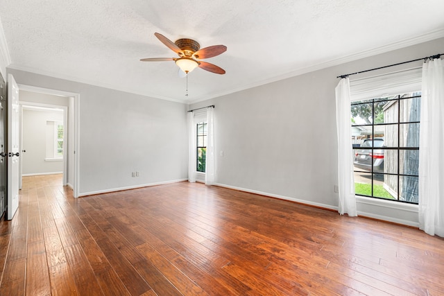 1907 Round Lake Dr, Houston, TX 77077 - unfurnished room with a ceiling fan, wood-type flooring, crown molding, healthy amount of natural light, and baseboards