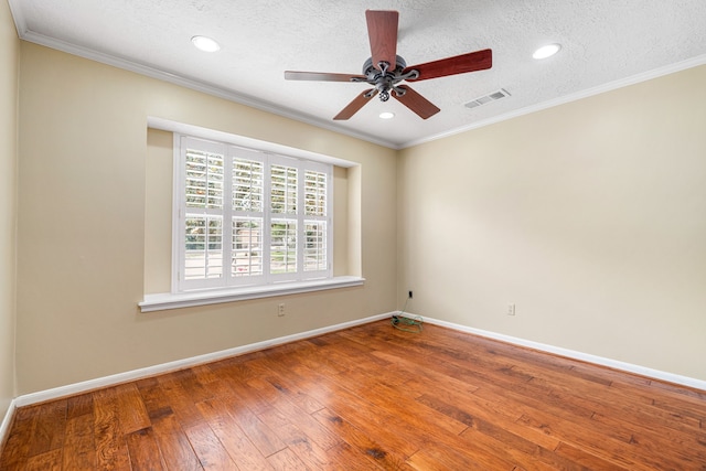 1907 Round Lake Dr, Houston, TX 77077 - unfurnished room with hardwood / wood-style floors, baseboards, a textured ceiling, ceiling fan, and crown molding