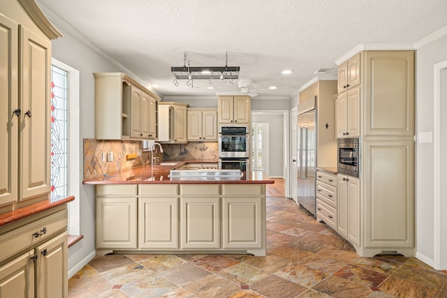 1907 Round Lake Dr, Houston, TX 77077 - kitchen with cream cabinets, built in appliances, a peninsula, backsplash, and crown molding