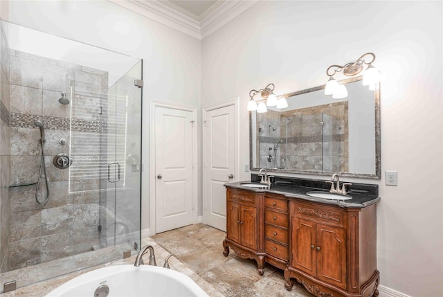 2510 Travis St Unit 301, Houston, TX 77006 - bathroom featuring ornamental molding, a stall shower, double vanity, a tub to relax in, and baseboards