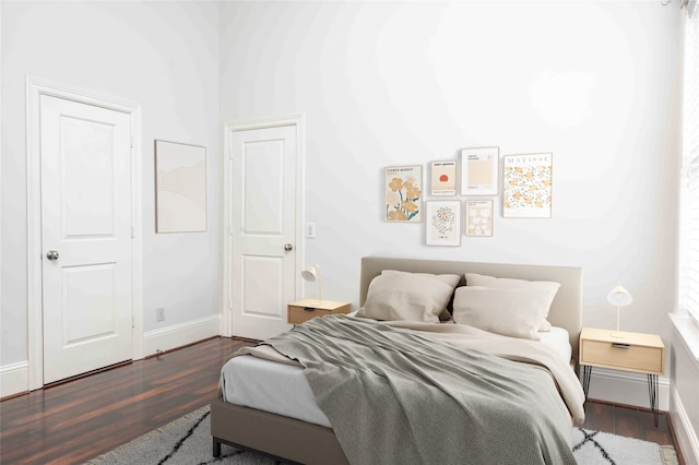 2510 Travis St Unit 301, Houston, TX 77006 - bedroom featuring dark wood finished floors and baseboards