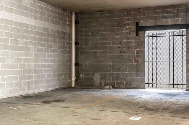 2510 Travis St Unit 301, Houston, TX 77006 - parking garage featuring concrete block wall