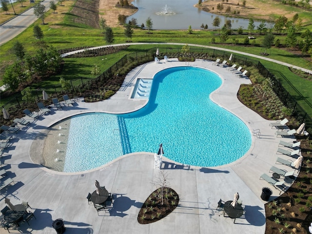 19253 Hazel Firs Ct, Magnolia, TX 77355 - community pool featuring a water view and a patio area