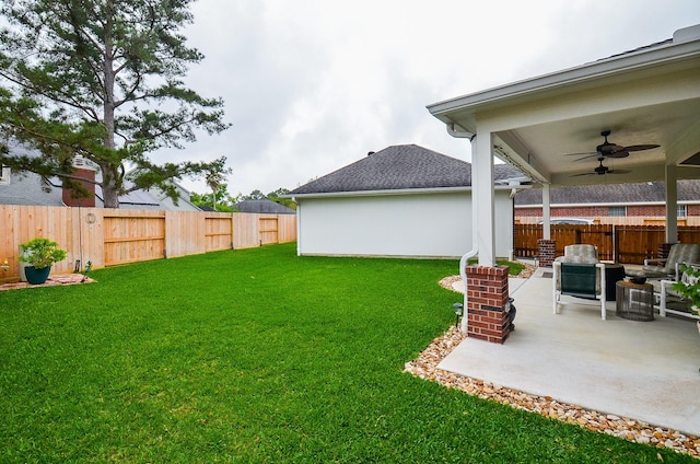 17619 Rustling Aspen Ln, Houston, TX 77095 - fenced backyard featuring a ceiling fan, a patio, and an outdoor hangout area