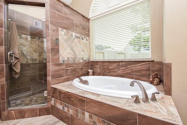 17619 Rustling Aspen Ln, Houston, TX 77095 - bathroom with a bath and a shower stall