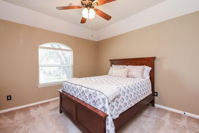 17619 Rustling Aspen Ln, Houston, TX 77095 - bedroom with light colored carpet and a ceiling fan