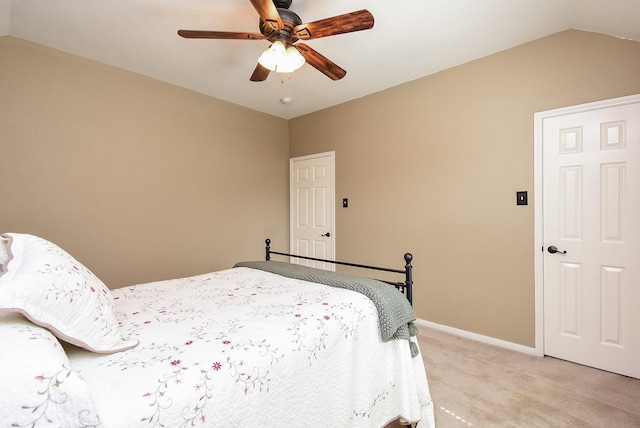 17619 Rustling Aspen Ln, Houston, TX 77095 - bedroom featuring light colored carpet, lofted ceiling, and ceiling fan