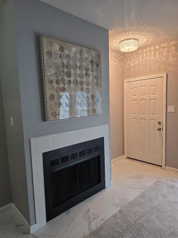 334 Wilcrest Dr Unit 334, Houston, TX 77042 - detailed view of a fireplace and baseboards