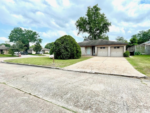13011 Harwin Dr, Houston, TX 77072 - view of front facade with a garage, concrete driveway, and a front lawn