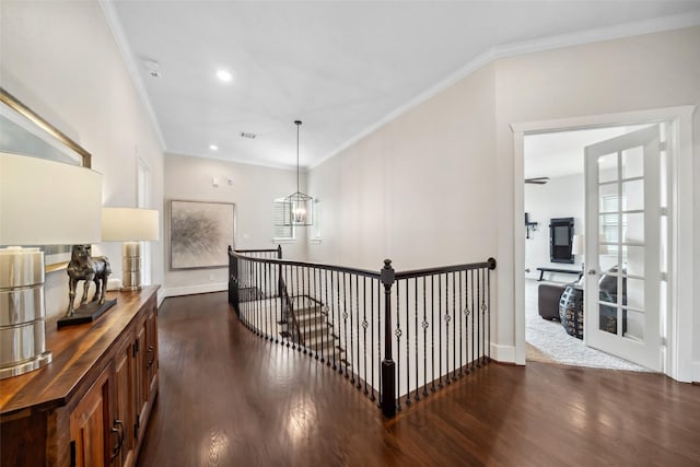 1746 Du Barry Ln, Houston, TX 77018 - hallway with ornamental molding, dark wood-type flooring, baseboards, an upstairs landing, and recessed lighting