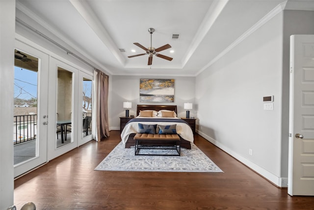 1746 Du Barry Ln, Houston, TX 77018 - bedroom with french doors, access to exterior, dark wood finished floors, recessed lighting, and a raised ceiling