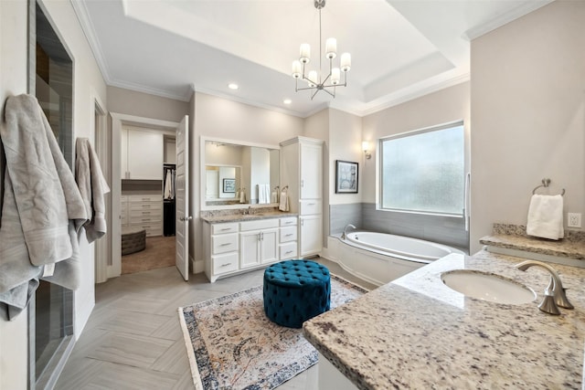 1746 Du Barry Ln, Houston, TX 77018 - bathroom with two vanities, a bath, a chandelier, recessed lighting, and crown molding