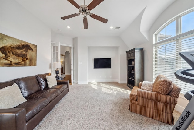 1746 Du Barry Ln, Houston, TX 77018 - carpeted living area featuring baseboards, ceiling fan, arched walkways, and recessed lighting
