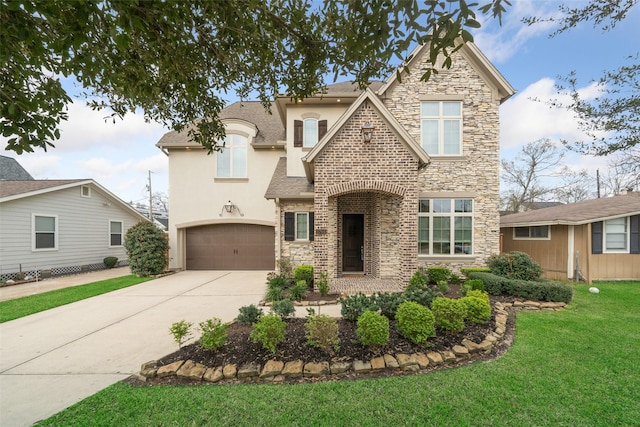 1746 Du Barry Ln, Houston, TX 77018 - view of front of house featuring stone siding, an attached garage, concrete driveway, and stucco siding
