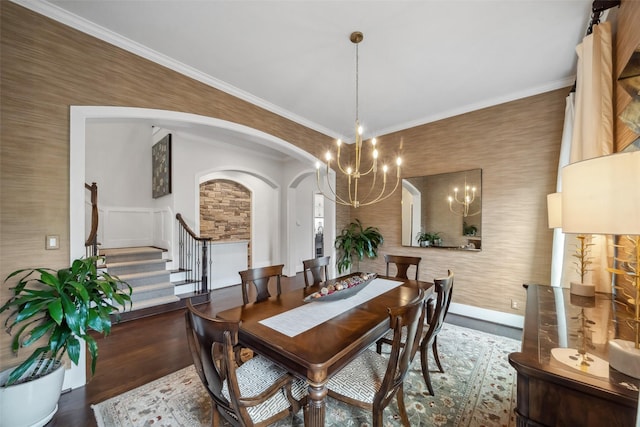 1746 Du Barry Ln, Houston, TX 77018 - dining area with wallpapered walls, stairway, arched walkways, wood finished floors, and ornamental molding