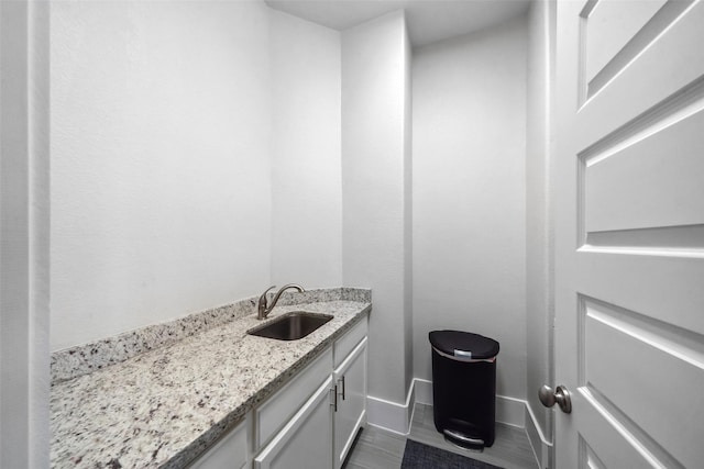 1746 Du Barry Ln, Houston, TX 77018 - bathroom with vanity, baseboards, and wood finished floors