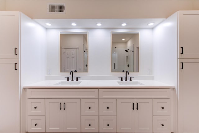 16727 Camber Ct, Crosby, TX 77532 - full bath with double vanity and a shower with door