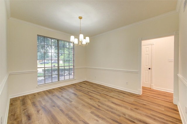 16727 Camber Ct, Crosby, TX 77532 - unfurnished room with a chandelier, wood finished floors, crown molding, and baseboards