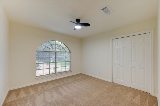 16727 Camber Ct, Crosby, TX 77532 - unfurnished bedroom featuring carpet, a closet, baseboards, and a ceiling fan