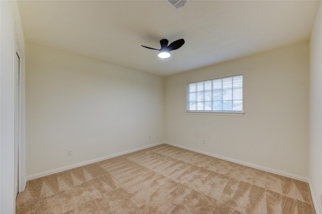 16727 Camber Ct, Crosby, TX 77532 - spare room featuring light colored carpet, baseboards, and ceiling fan