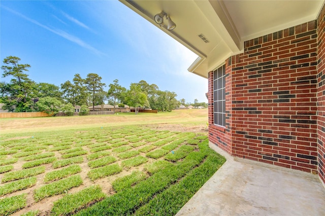 16727 Camber Ct, Crosby, TX 77532 - view of grassy yard with a patio area