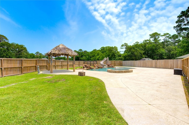 16727 Camber Ct, Crosby, TX 77532 - view of yard with a gazebo, a patio, and an in-ground hot tub