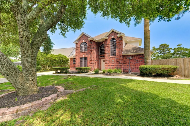 16727 Camber Ct, Crosby, TX 77532 - traditional-style house featuring brick siding and roof with shingles