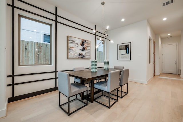 1851 Sul Ross St, Houston, TX 77098 - dining space with light wood-type flooring, a chandelier, baseboards, and recessed lighting