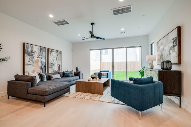 1851 Sul Ross St, Houston, TX 77098 - living room featuring light wood finished floors, recessed lighting, ceiling fan, and baseboards