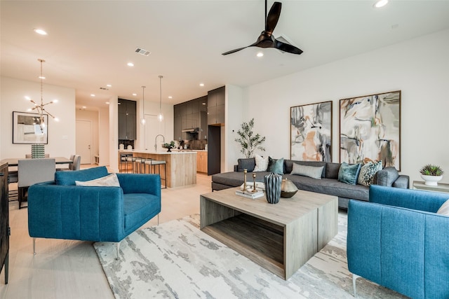 1851 Sul Ross St, Houston, TX 77098 - living area with a ceiling fan, a chandelier, and recessed lighting