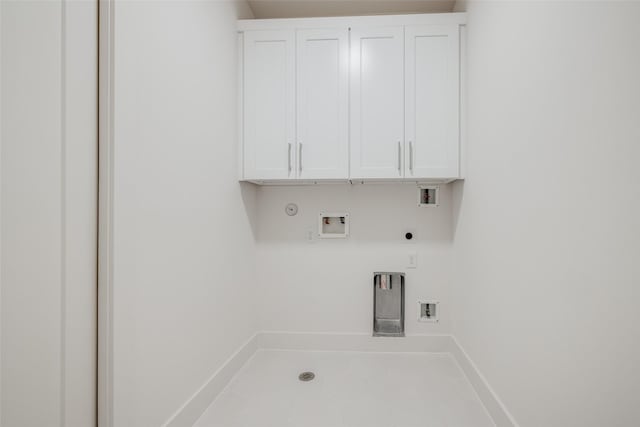 1851 Sul Ross St, Houston, TX 77098 - washroom with gas dryer hookup, electric dryer hookup, cabinet space, washer hookup, and baseboards