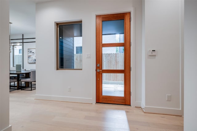 1851 Sul Ross St, Houston, TX 77098 - entryway featuring baseboards and wood finished floors
